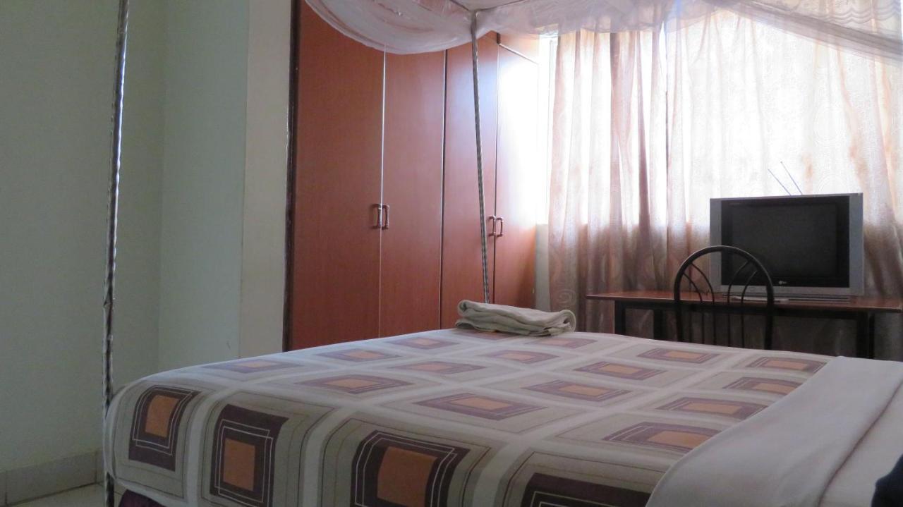 Global Village Hotel Pakwach Buitenkant foto